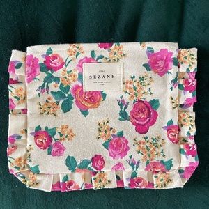 Sezane pouch with floral design. Brand new